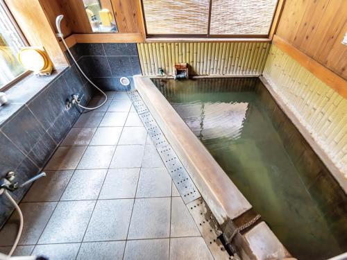 Koupelna v ubytování J-Hoppers Kumano Yunomine Guesthouse