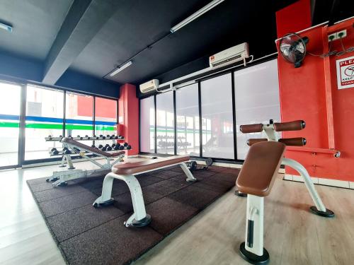 a gym with two treadmills and a row of treadms at KLIA One City 2 Room Taipan USJ 21 Puchong Putra Height Shah Alam Hi-Com Cyberjaya Putrajaya in Subang Jaya