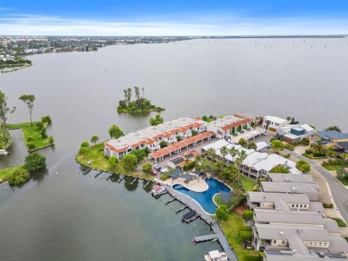 an aerial view of a resort on the water at Yarrawonga Lakeside Apartment 50 in Mulwala
