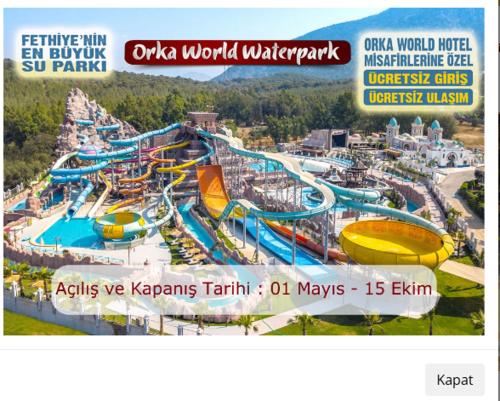 an advertisement for a water park with a water slide at Orka World Hotel & Aquapark in Oludeniz
