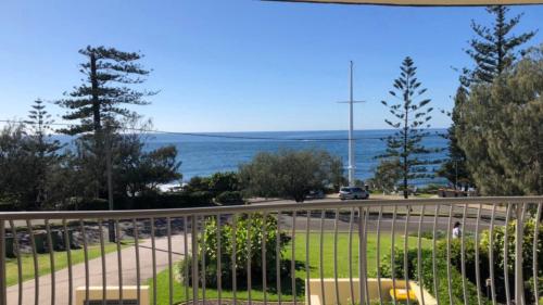 a view of the ocean from a balcony at Sea Eagles Unit 4 in Caloundra