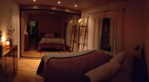 Ένα ή περισσότερα κρεβάτια σε δωμάτιο στο Aurora's house Rovaniemi