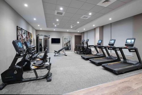 a gym with treadmills and elliptical machines at Homewood Suites By Hilton Boston Logan Airport Chelsea in Chelsea