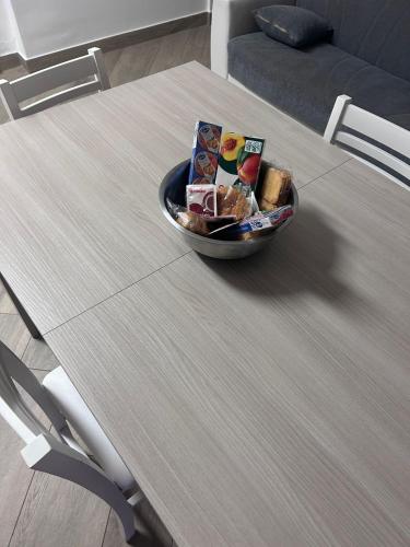 a bowl of food on top of a table at Azzurra House treno Milano in Santo Stefano Ticino