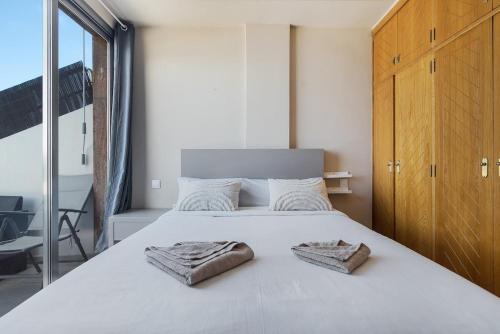 Spacious Two Bedroom Apartment with Terrace right on the Surf Beach