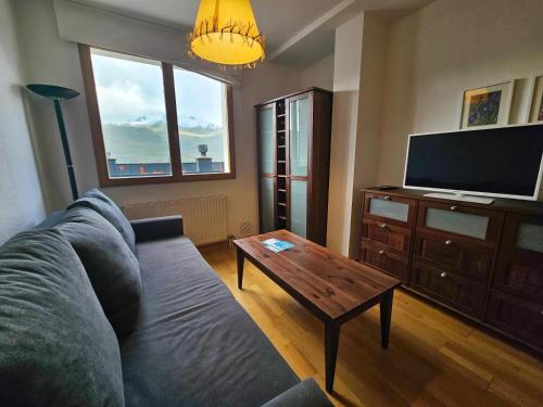 TV a/nebo společenská místnost v ubytování Apartamentos 3000 Formigal