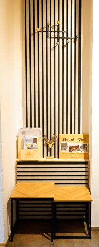 a bench with boxes sitting on top of it at Haus Schrettl Hintergrünholz in Itter