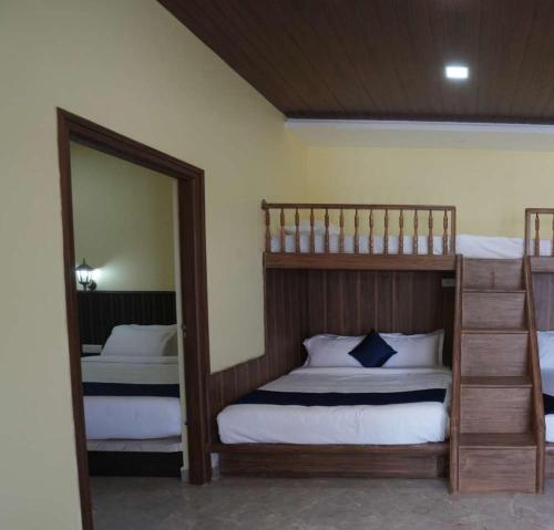 Postel nebo postele na pokoji v ubytování Coastal Grand Resorts - Akshaya