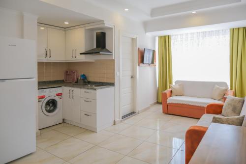 Η κουζίνα ή μικρή κουζίνα στο Cemal Bey Apart Otel