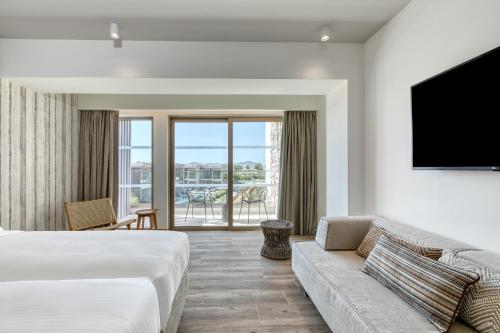 Postel nebo postele na pokoji v ubytování Utopia Blu Hotel