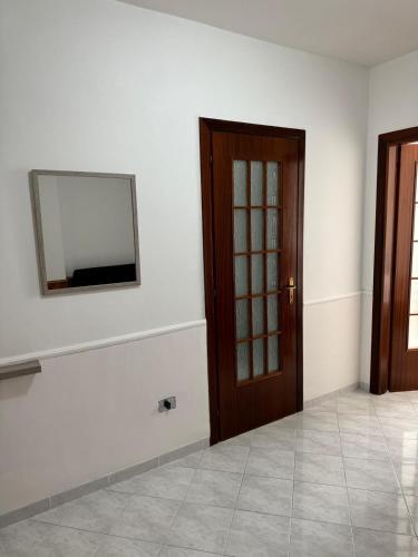 Μια τηλεόραση ή/και κέντρο ψυχαγωγίας στο Appartamento piano terra