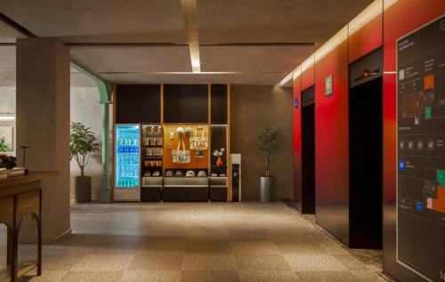 a hallway of a building with a store at M Village Hotel Da Nang Centre - Free Laundry and Kitchen in Da Nang