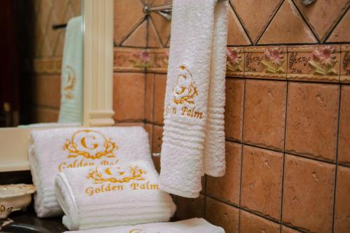 Koupelna v ubytování Golden Palm Boutique