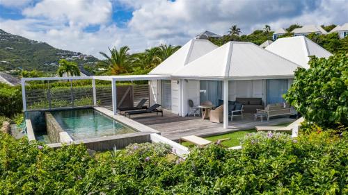 an aerial view of a house with a swimming pool at Haven of peace villa in a perfect setting in Marigot
