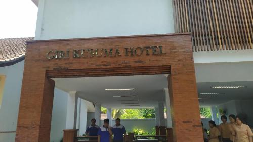 a group of people standing in front of a hotel at Giri Kusuma Hotel Payangan in Payangan