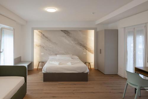 Postel nebo postele na pokoji v ubytování Albergo Panorama