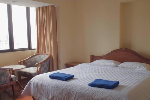 Katil atau katil-katil dalam bilik di Spacious room in Sukhumvit Nana