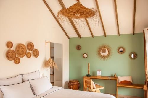 Postel nebo postele na pokoji v ubytování Heritage Ecolodge