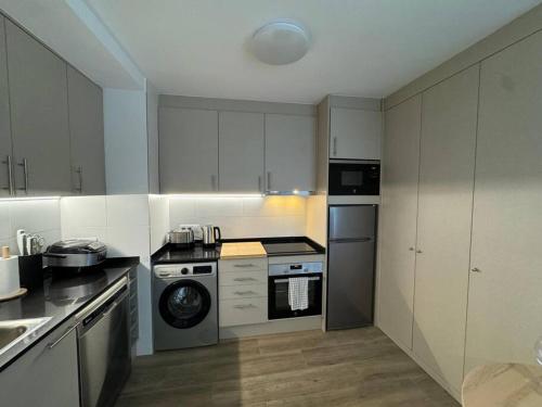 Dapur atau dapur kecil di Modern Loft in Pas de la Casa, wifi, ski