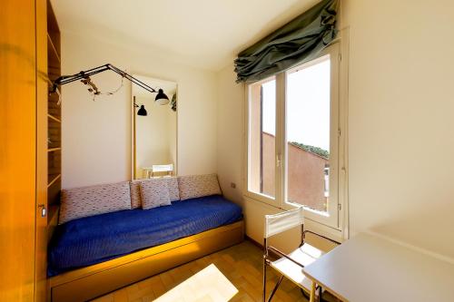 Postel nebo postele na pokoji v ubytování Casa Luisa a Capo d'Arco - Goelba