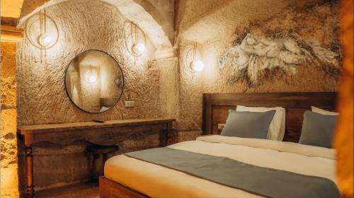 Postel nebo postele na pokoji v ubytování La Fairy Cappadocia
