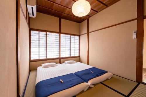 Cama o camas de una habitación en お宿一の華