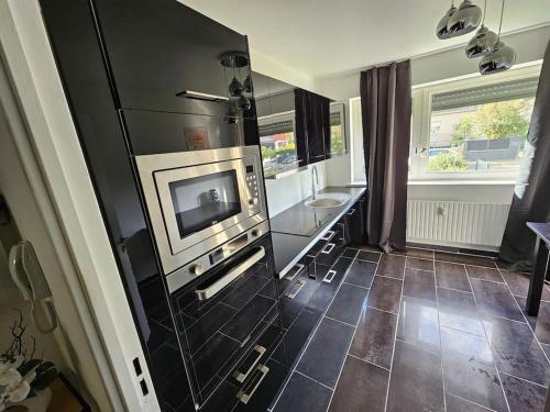 Photo de la galerie de l'établissement Charmant Appartement Moderne 71m2 à Illzach - Mulhouse - Parking gratuit, à Illzach