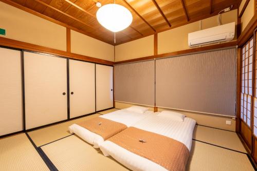 Cama o camas de una habitación en お宿一の華