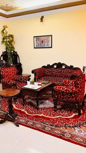 a living room with a couch and a table at Hotel Master Paradise, Pushkar, Rajasthan , INDIA in Pushkar