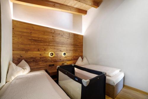 Postel nebo postele na pokoji v ubytování Chalet Resort Innerluferhof