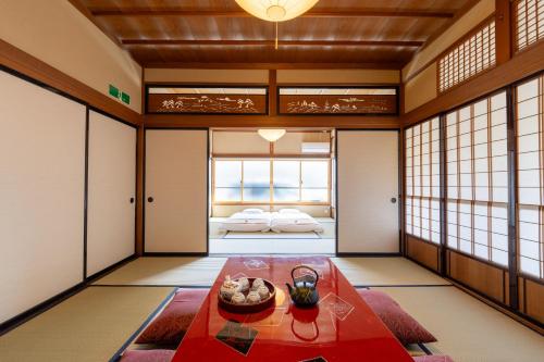 Cama o camas de una habitación en お宿一の華