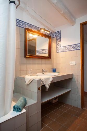 a bathroom with a sink and a mirror at CASA ANITA 4 pax in Ses Salines