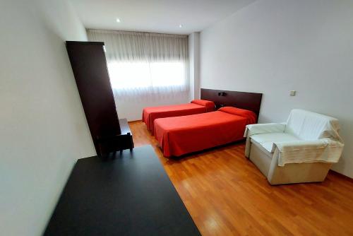 Postel nebo postele na pokoji v ubytování Domocenter Apartamentos Turísticos