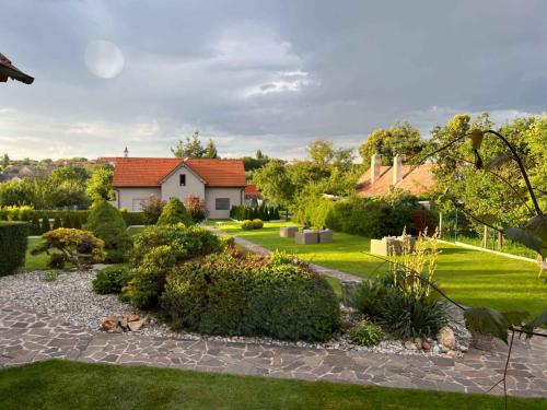 a garden with a house in the background at U HRÁDKU Superior in Znojmo