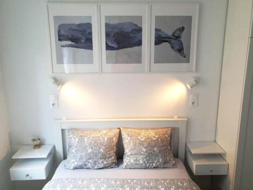 Ένα ή περισσότερα κρεβάτια σε δωμάτιο στο Apartament Przy Starówce - Hampton