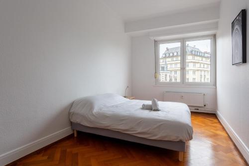 Postel nebo postele na pokoji v ubytování Le Hoffman - Joli appt tout confort à Strasbourg