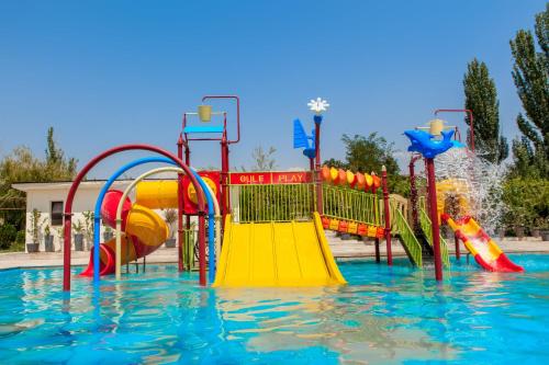a water park with a colorful water slide at Cross Resort Hotel in Yerevan