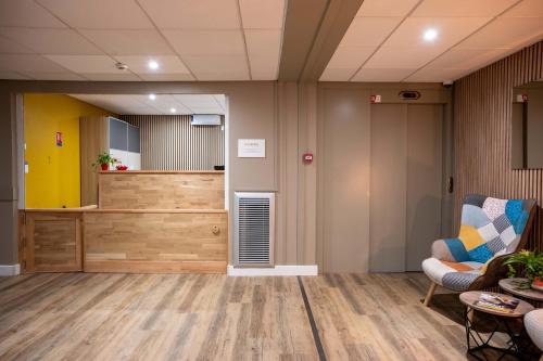 Comfort Aparthotel Besancon La Cityにあるシーティングエリア