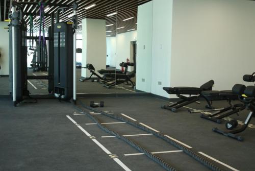 an empty gym with a bunch of chairs in a room at 01 Sepco III Residence 2 by EC Homes Rentals in Dubai