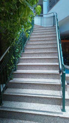 a set of stairs leading up to a building at Pousada dos Girassóis in Palmas