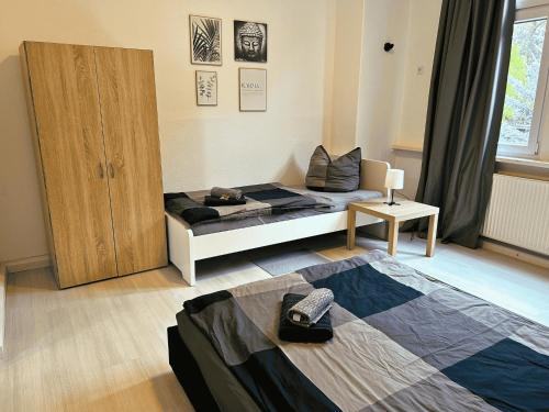 Postel nebo postele na pokoji v ubytování Monteurwohnung Burchard I Rosenau - Platz für 6 Personen
