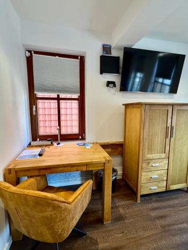 Μια τηλεόραση ή/και κέντρο ψυχαγωγίας στο Aparthotel Pumpengasse