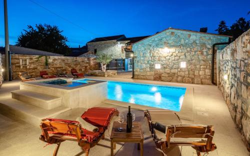 Rustic stone holiday house with pool