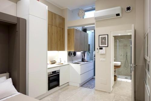 Kuchyň nebo kuchyňský kout v ubytování Parva Domus Bari