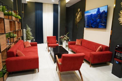Гостиная зона в Garnet Mir Hotel