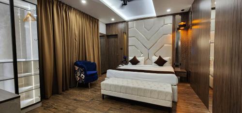 Una cama o camas en una habitación de Hotel Arcadia