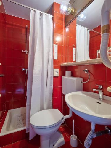 Ένα μπάνιο στο Koversada Rooms