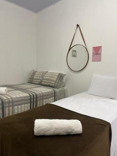 Katil atau katil-katil dalam bilik di Apartamentos Vitória