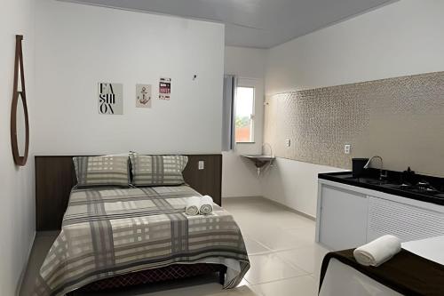 Katil atau katil-katil dalam bilik di Apartamentos Vitória