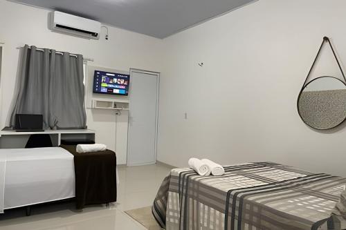 Katil atau katil-katil dalam bilik di Apartamentos Vitória